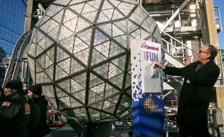 Jeffrey Straus, President of Countdown Entertainment, stands with the six-ton, 12-foot diameter New Year's Eve ball atop One Times Square in New York City on Friday, December 30, 2022. (AP Photo/Ted Shaffrey)