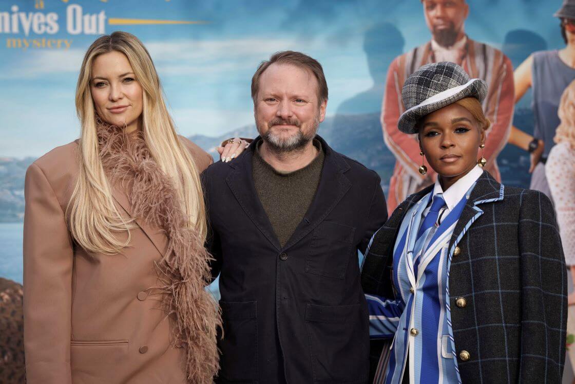 Kate Hudson, from left, Rian Johnson and Janelle Monae pose for photographers upon arrival for the photo call of the film 'Glass Onion: A Knives Out Mystery' in London, Saturday, Dec. 17, 2022. (Photo by Scott Garfitt/Invision/AP)