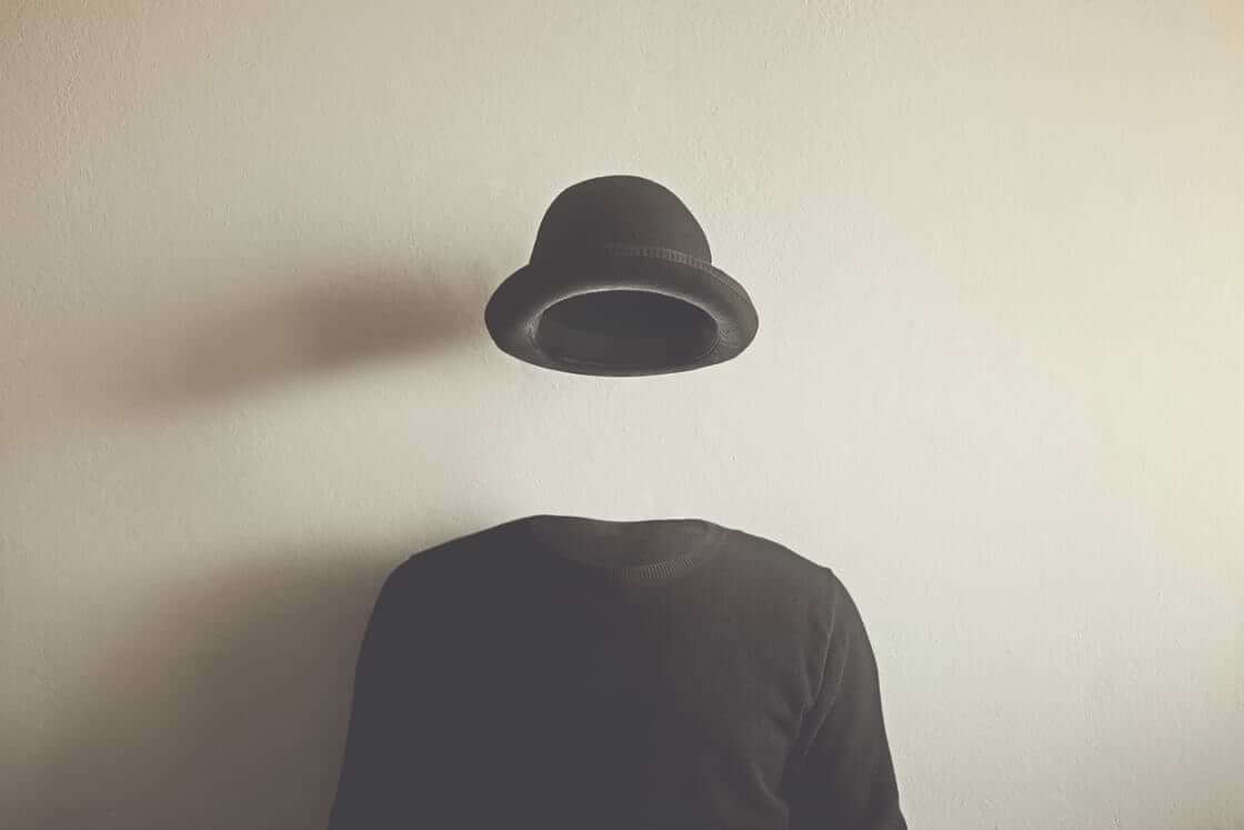 An invisible man wears a black bowler hat and black sweater. © By fran_kie/stock.adobe.com