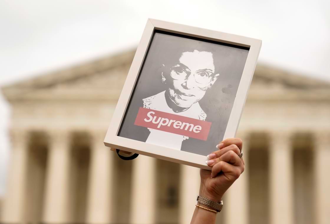 A protester holds up an image of late Supreme Court Justice Ruth Bader Ginsburg outside of the U.S. Supreme Court, Thursday, May 5, 2022, during a demonstration in Washington. (AP Photo/Mariam Zuhaib). Note: This is not the sculpture mentioned in the accompanying article.