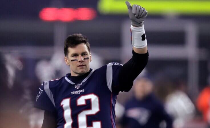 FILE - In this Jan. 4, 2020 file photo, New England Patriots quarterback Tom Brady signals to a teammate before the team's NFL wild-card playoff football game against the Tennessee Titans in Foxborough, Mass. Brady, the seven-time Super Bowl winner with New England and Tampa Bay, announced his retirement from the NFL on Wednesday, Feb. 1, 2023 exactly one year after first saying his playing days were over, by posting a brief video lasting just under one minute on social media. (AP Photo/Charles Krupa, File)