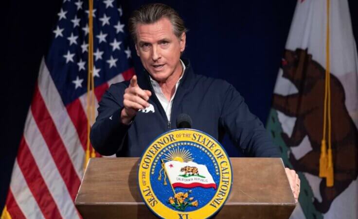 FILE - California Gov. Gavin Newsom speaks in Sacramento, Calif., Jan. 10, 2023. On Wednesday, March 8, 2023, Newsom announced he would not renew a state contract with Walgreens after the company indicated it would not sell abortion pills in some conservative-led states. (AP Photo/José Luis Villegas, File). Actions like this are leading some cities and communities in the United States to consider secession.