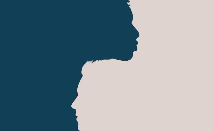 Racial unity. Profile head silhouette of African American man intersecting into another Caucasian man.