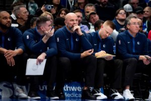 Dallas Mavericks Head Coach Jason Kidd watches his players from the bench in the first half of an NBA game against the Cleveland Cavaliers in Dallas, Texas, Wednesday, Dec. 14, 2022. (AP Photo/Emil Lippe)