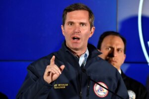 Kentucky Gov. Andy Beshear speaks to reporters during a news conference in Louisville, Ky., Monday, April 10, 2023. A shooting at the Old National Bank killed and wounded several people, according to police. The suspected shooter is also dead. (AP Photo/Timothy D. Easley)