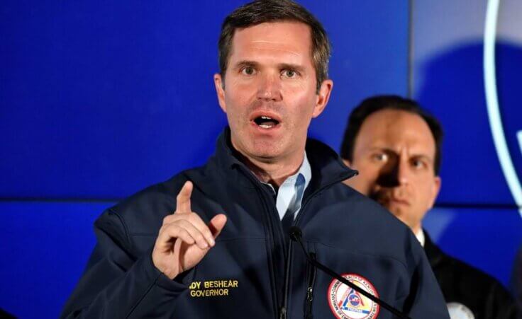 Kentucky Gov. Andy Beshear speaks to reporters during a news conference in Louisville, Ky., Monday, April 10, 2023. A shooting at the Old National Bank killed and wounded several people, according to police. The suspected shooter is also dead. (AP Photo/Timothy D. Easley)