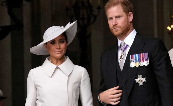 Prince Harry and Meghan Markle, Duke and Duchess of Sussex leave after a service of thanksgiving for the reign of Queen Elizabeth II at St Paul's Cathedral in London, Friday, June 3, 2022.