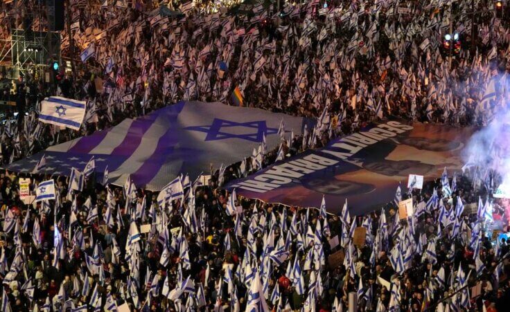 Israelis protest plans by Prime Minister Benjamin Netanyahu's government to overhaul the judicial system, in Tel Aviv, Israel, Saturday, April 1, 2023.