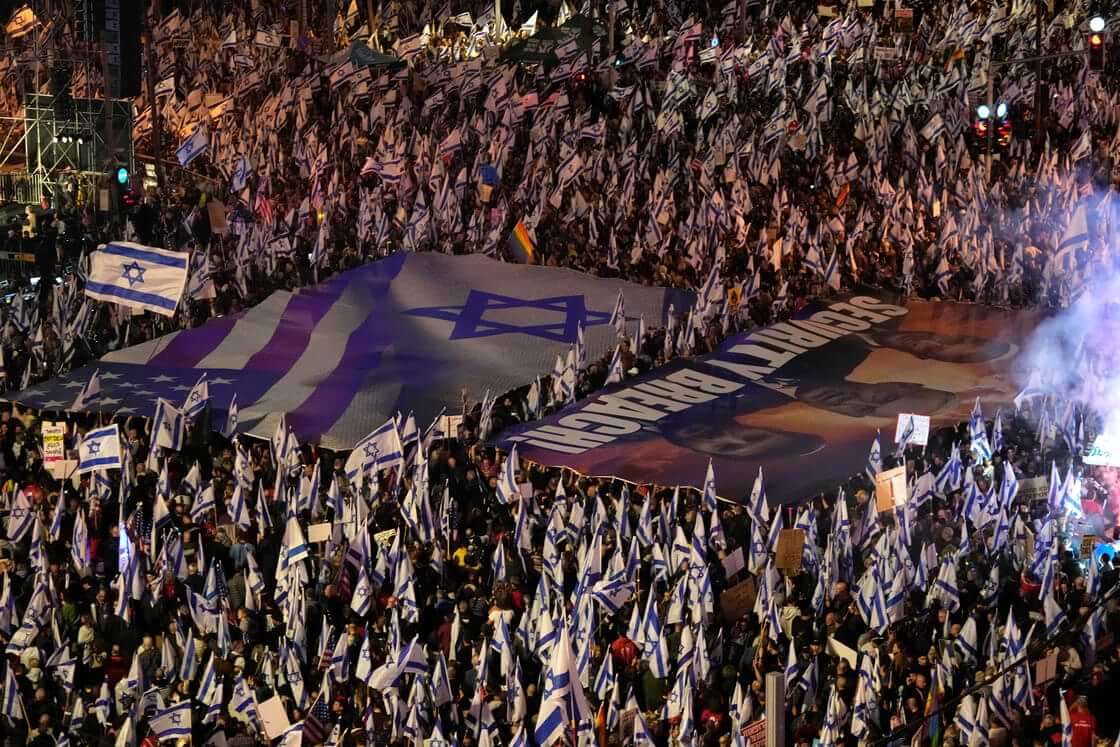 Israelis protest plans by Prime Minister Benjamin Netanyahu's government to overhaul the judicial system, in Tel Aviv, Israel, Saturday, April 1, 2023.