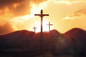 Three crosses on a hillside depicting Easter. © By artpluskr/stock.adobe.com