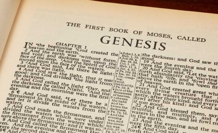 Bible opened to Genesis