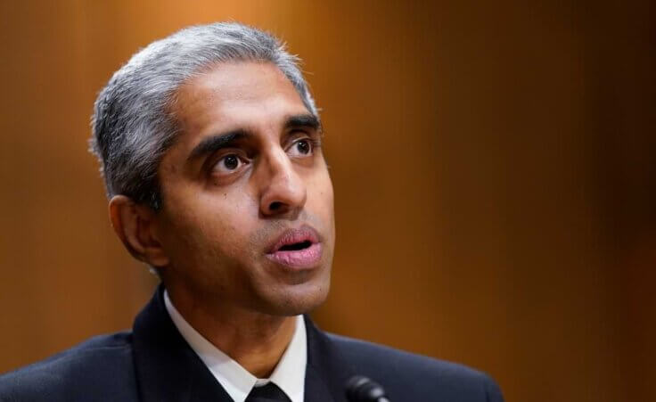 U.S. Surgeon General Dr. Vivek Murthy testifies before the Senate Finance Committee on Capitol Hill in Washington, on Feb. 8, 2022. The Surgeon General is warning there is not enough evidence to show that social media is safe for young people — and is calling on tech companies, parents and caregivers to take "immediate action to protect kids now."