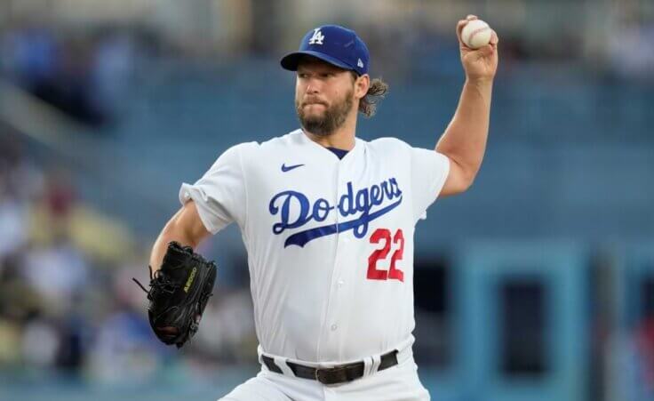 Los Angeles Dodgers starting pitcher Clayton Kershaw (22) throws during the first inning of a baseball game against the Minnesota Twins in Los Angeles, Tuesday, May 16, 2023. (AP Photo/Ashley Landis)