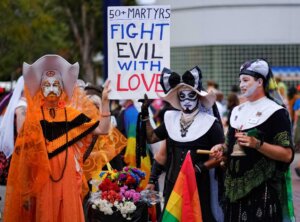 FILE - The Sisters of Perpetual Indulgence, participate in the gay pride parade in West Hollywood, Calif. on June 12, 2016. The Los Angeles Dodgers have removed a satirical LGBTQ+ group called the Sisters of Perpetual Indulgence from the team’s annual Pride Night after opposition from conservative Catholic groups. The team announced Wednesday, May 17, 2023, that the group, which primarily consists of men dressed as nuns, wouldn't receive an award during the June 16 event, citing the “strong feelings” of people who were offended. (AP Photo/Richard Vogel,File)