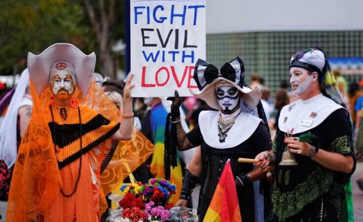 FILE - The Sisters of Perpetual Indulgence, participate in the gay pride parade in West Hollywood, Calif. on June 12, 2016. The Los Angeles Dodgers have removed a satirical LGBTQ+ group called the Sisters of Perpetual Indulgence from the team’s annual Pride Night after opposition from conservative Catholic groups. The team announced Wednesday, May 17, 2023, that the group, which primarily consists of men dressed as nuns, wouldn't receive an award during the June 16 event, citing the “strong feelings” of people who were offended. (AP Photo/Richard Vogel,File)