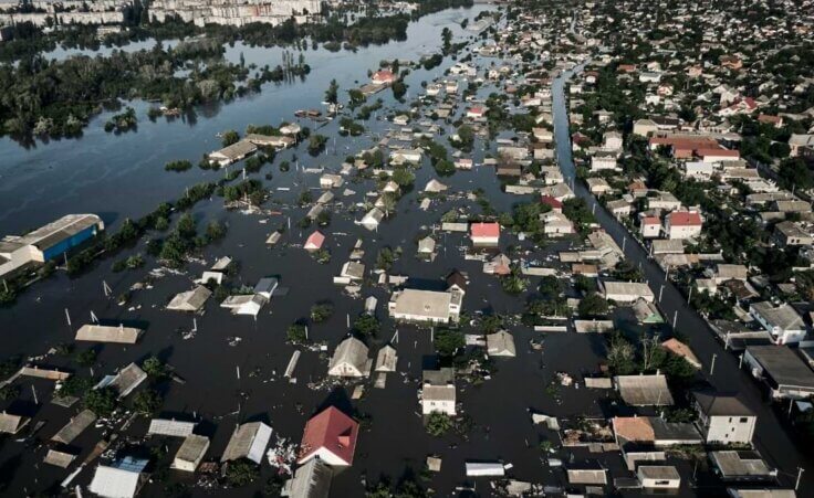 Streets are flooded in Kherson, Ukraine, Wednesday, June 7, 2023 after the walls of the Kakhovka dam collapsed. Residents of southern Ukraine, some who spent the night on rooftops, braced for a second day of swelling floodwaters on Wednesday as authorities warned that a Dnieper River dam breach would continue to unleash pent-up waters from a giant reservoir. (AP Photo/Libkos)