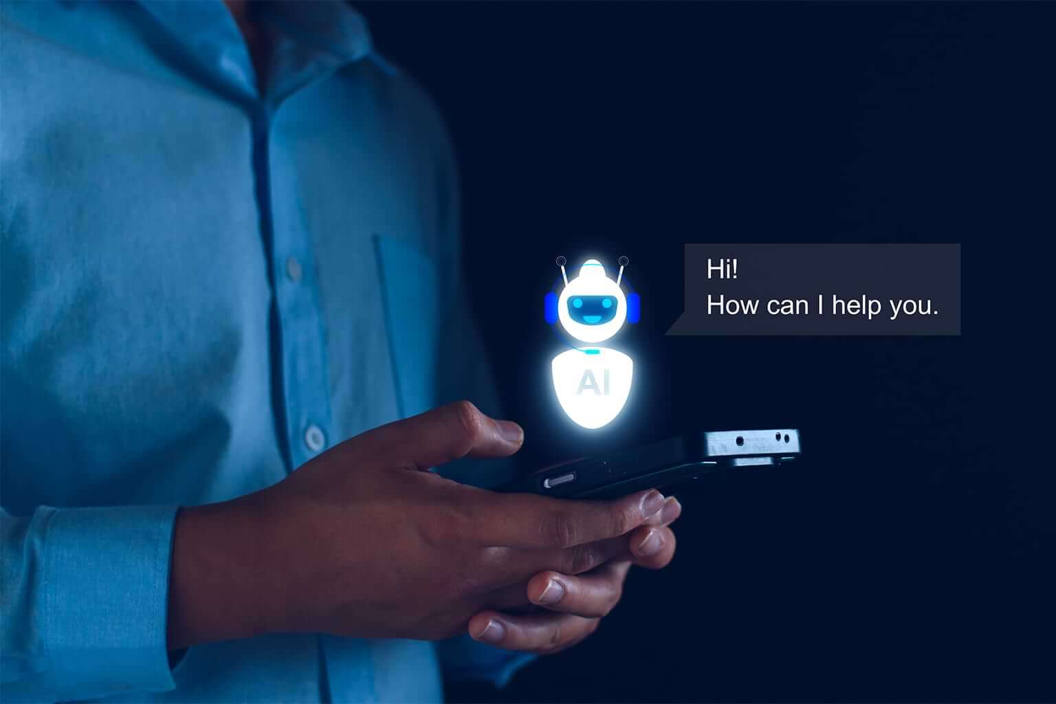 A man holds a phone in his hands. A hologram of a robot, representative of AI like ChatGPT, hovers over the phone, the words, "Hi! How can I help." appearing next to the robot. Can ChatGPT understand theology? © By LALAKA/stock.adobe.com
