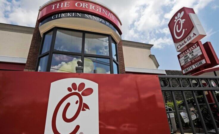 FILE - This July 19, 2012, file photo, shows a Chick-fil-A fast food restaurant in Atlanta, GA. (AP Photo/Mike Stewart, File). Some Christians are threatening to boycott the fast-food chain for its DEI policy.