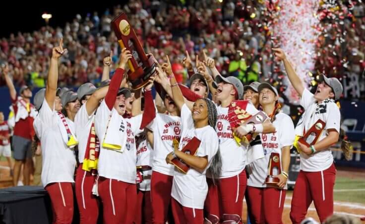 Oklahoma players celebrate with the trophy after defeating Florida State in the NCAA Women's College World Series championship series, Thursday, June 8, 2023, in Oklahoma City. (AP Photo/Nate Billings). The OU softball team has also made headlines for its Christian witness.