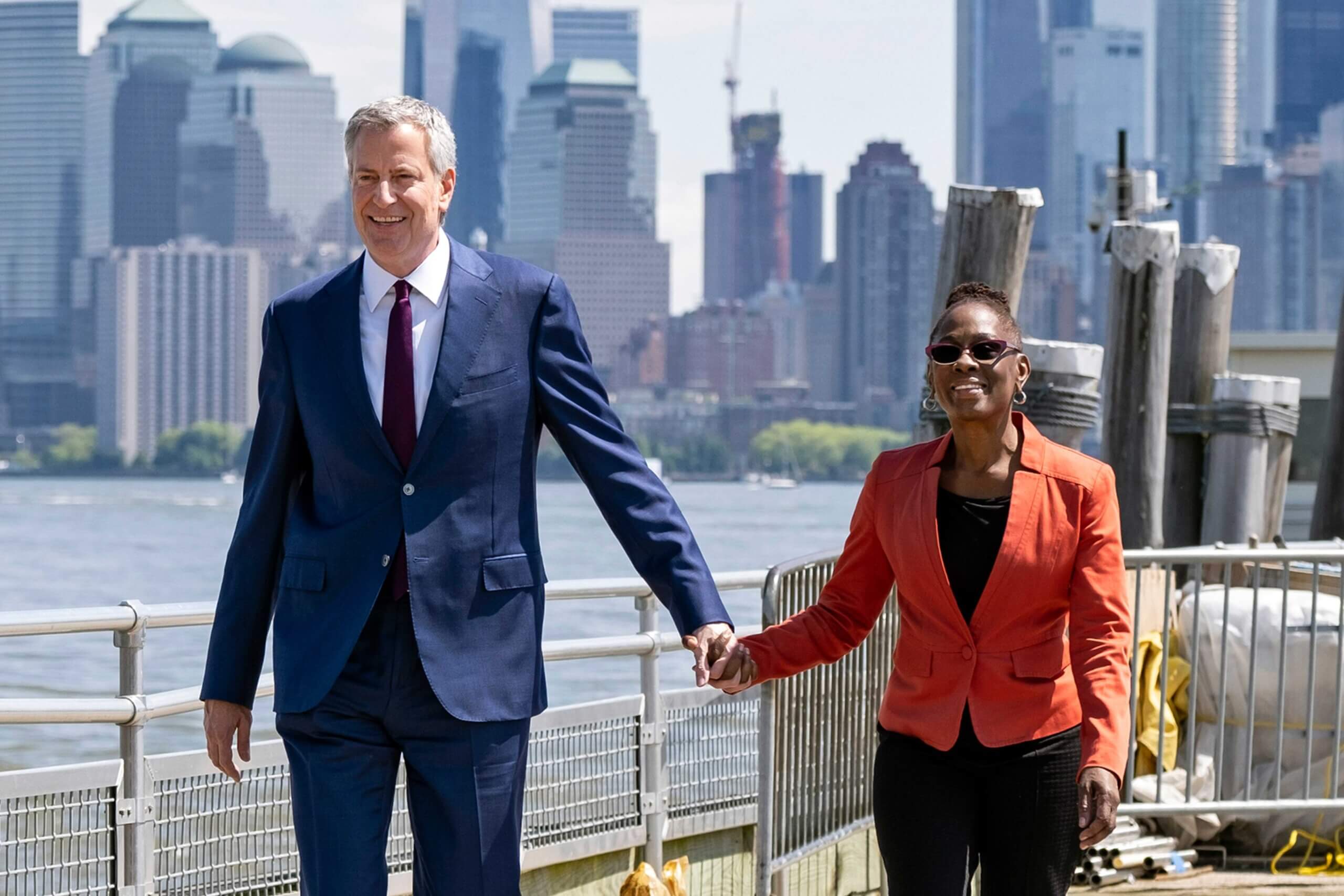 FILE - New York City Mayor Bill de Blasio and his wife Chirlane McCray arrive for the official dedication ceremony of the Statue of Liberty Museum on Liberty Island, May 16, 2019, in New York. Former New York CIty Mayor de Blasio and McCray are separating but not divorcing after 29 years of a marriage that helped lift de Blasio into the mayor's job. (AP Photo/Craig Ruttle, File)
