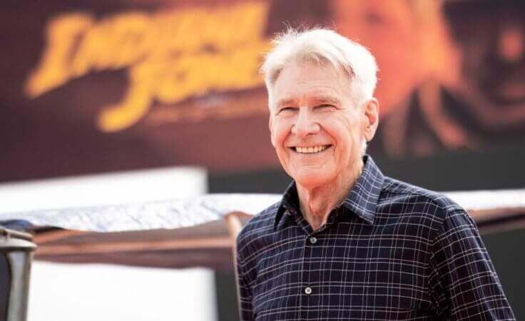 Harrison Ford poses for photographers at the photo call for the film 'Indiana Jones and the Dial of Destiny' at the 76th international film festival, Cannes, southern France, Thursday, May 18, 2023. (Photo by Vianney Le Caer/Invision/AP)