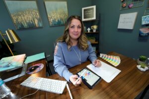 Web designer Lorie Smith is shown in her office on Monday, Nov. 7, 2022, in the southwest part of Littleton, Colo. (AP Photo/David Zalubowski). On Friday, June 30, 2023, the Supreme Court sided with Smith, who'd refused to design wedding websites for same-sex couples based on her Christian beliefs.