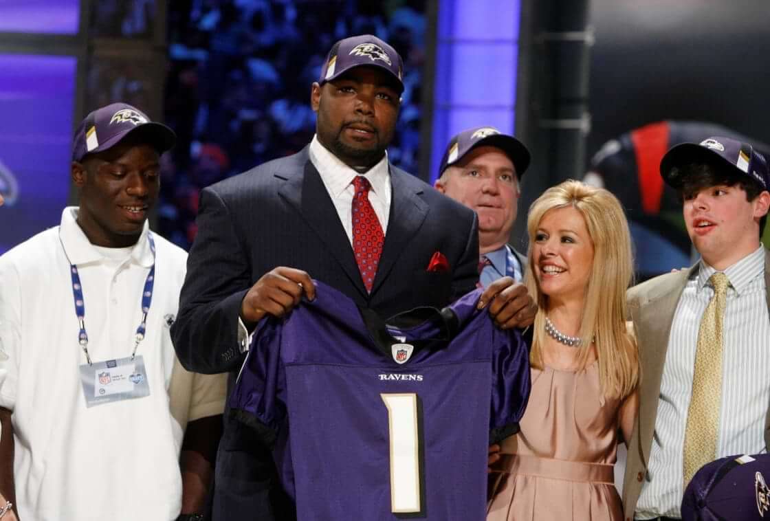 Michael Oher, a tackle from Mississippi, is selected as the No. 26th overall pick by the Baltimore Ravens during the first round of the NFL football draft at Radio City Music Hall Saturday, April 25, 2009, in New York. (AP Photo/Jason DeCrow)