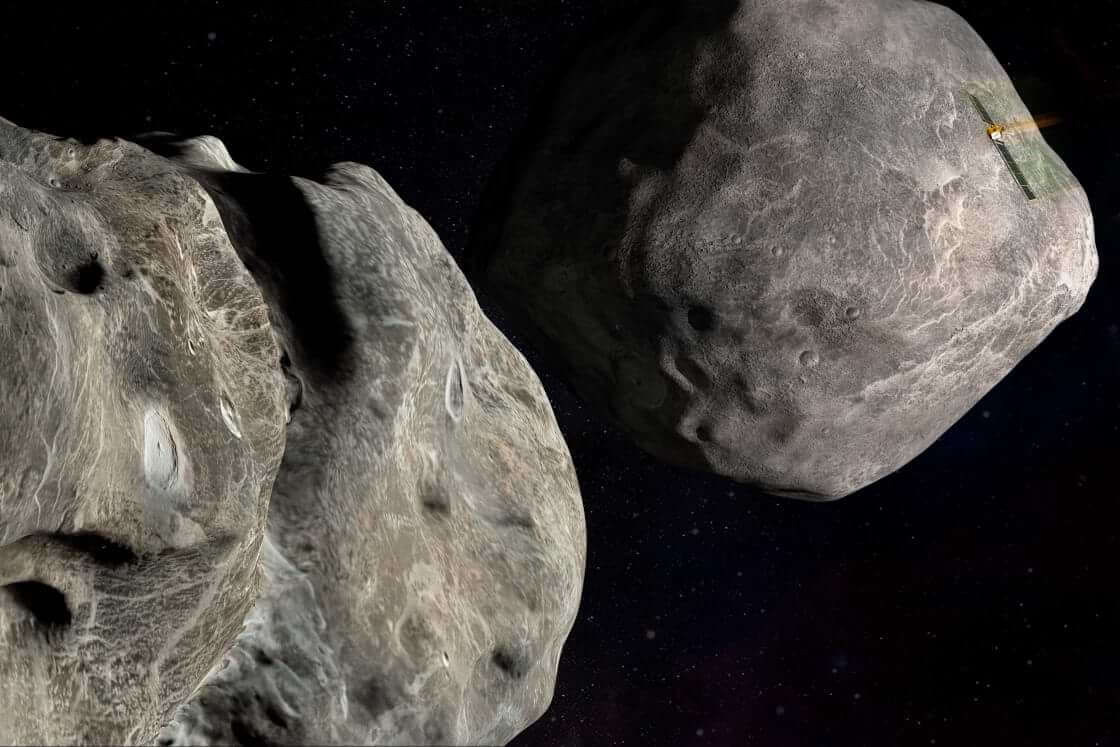 This illustration made available by Johns Hopkins APL and NASA depicts NASA's DART probe, upper right, on course to impact the asteroid Dimorphos, left, which orbits Didymos. DART is expected to zero in on the asteroid Monday, Sept. 26, 2022, intent on slamming it head-on at 14,000 mph. The impact should be just enough to nudge the asteroid into a slightly tighter orbit around its companion space rock. (Steve Gribben/Johns Hopkins APL/NASA via AP)