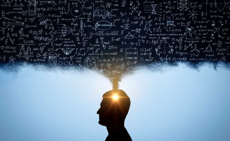 A black thought bubble containing dozens of written scientific equations balloons above the head of a silhouetted man's profile, his mind glowing. © By Tryfonov/stock.adobe.com
