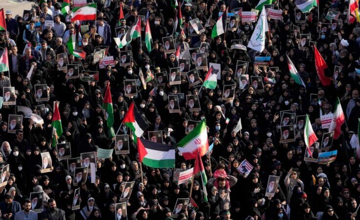 Iranian protestors attend an anti-Israel rally as they hold up posters of the Supreme Leader Ayatollah Ali Khamenei and Iranian and Palestinian flags, at Enqelab-e-Eslami (Islamic Revolution) Square in Tehran, Iran, Wednesday, Oct. 18, 2023. (AP Photo/Vahid Salemi)