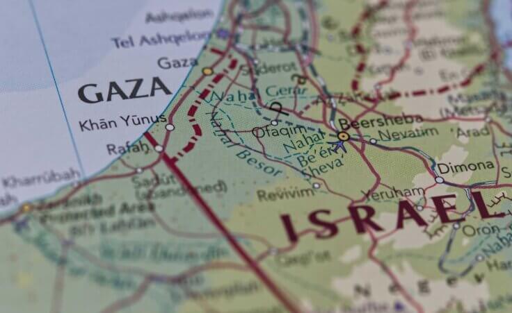 Closeup of a map featuring the Israel–Gaza border. By Robert/stock.adobe.com.