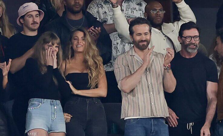 From left, Taylor Swift, Blake Lively, Ryan Reynolds and Hugh Jackman react during the first quarter of an NFL football game between the New York Jets and the Kansas City Chiefs, Sunday, Oct. 1, 2023, in East Rutherford, N.J. (AP Photo/Adam Hunger)