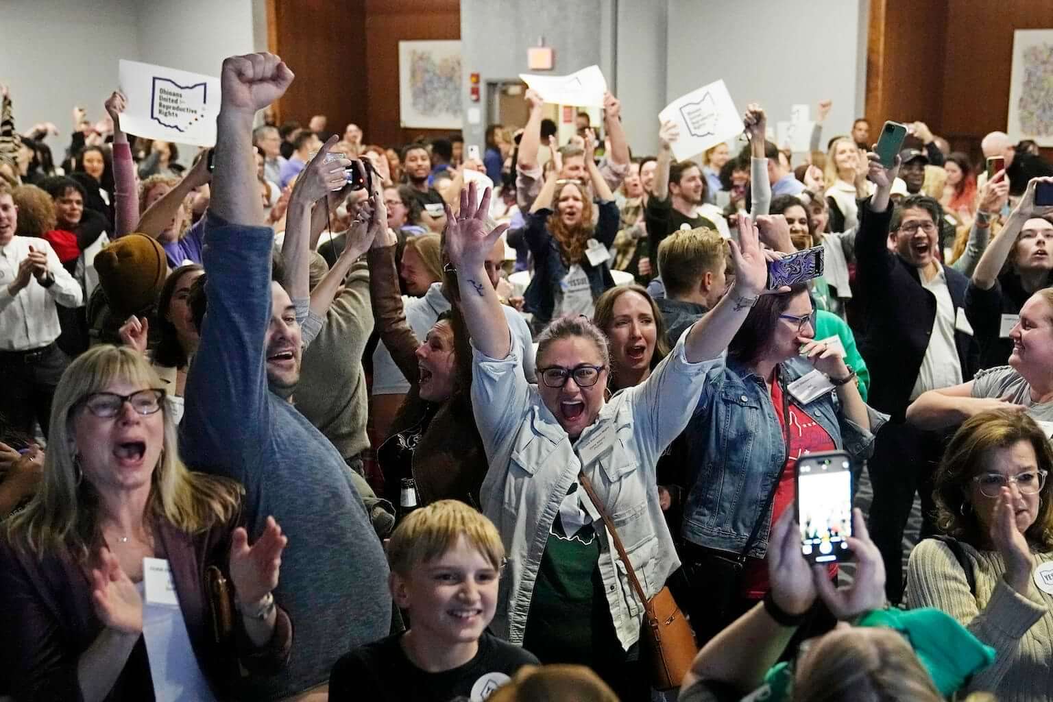 Issue 1 supporters cheer as they watch election results come in, Tuesday, Nov. 7, 2023, in Columbus Ohio. Ohio voters have approved a constitutional amendment that guarantees the right to abortion and other forms of reproductive health care. The outcome of Tuesday’s intense, off-year election was the latest blow for abortion opponents. (AP Photo/Sue Ogrocki)