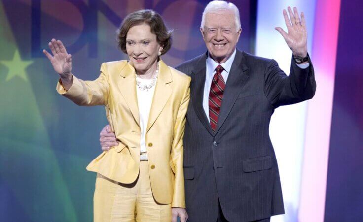 FILE - Former President Jimmy Carter, right, and his wife, former first lady Rosalynn Carter, wave to the audience at the Democratic National Convention in Denver, Aug. 25, 2008. Rosalynn Carter, the closest adviser to Jimmy Carter during his one term as U.S. president and their four decades thereafter as global humanitarians, died Sunday, Nov. 19, 2023. She was 96. (AP Photo/Ron Edmonds, File)