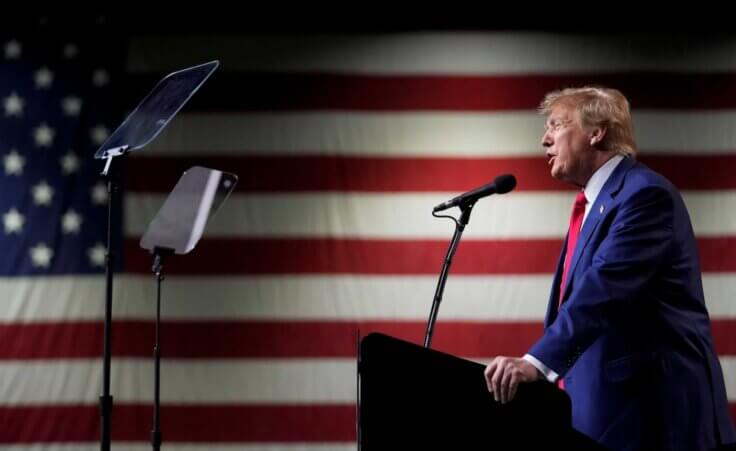 FILE - Former President Donald Trump speaks during a rally Sunday, Dec. 17, 2023, in Reno, Nev. The Colorado Supreme Court on Tuesday, Dec. 19, declared Trump ineligible for the White House under the U.S. Constitution’s insurrection clause and removed him from the state’s presidential primary ballot, setting up a likely showdown in the nation’s highest court to decide whether the front-runner for the GOP nomination can remain in the race. (AP Photo/Godofredo A. Vásquez, File)