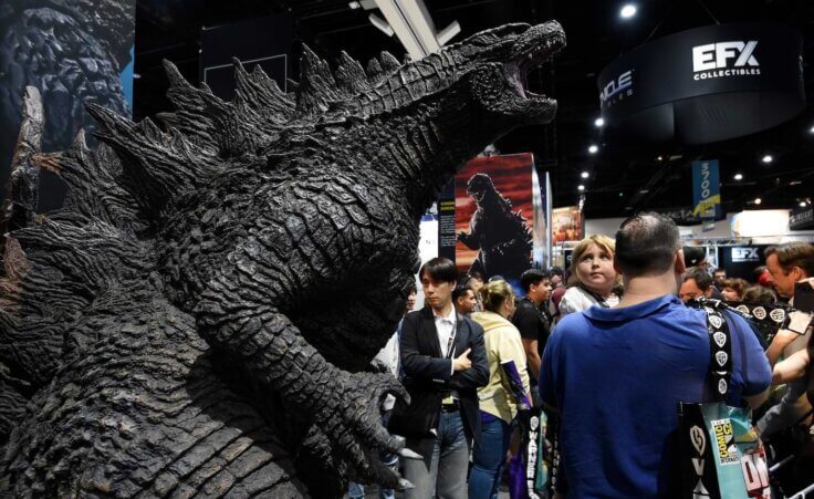 Marielle Larson, 3, looks over her father Derek's shoulder at an oversized Godzilla model on the convention floor during Preview Night at the 2019 Comic-Con International: San Diego, Wednesday, July 17, 2019, in San Diego, Calif. (Photo by Chris Pizzello/Invision/AP). This article also looks at why Americans say they're spiritual but not religious.