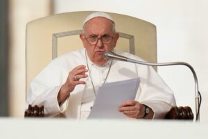 FILE - Pope Francis speaks during his weekly general audience in St. Peter's Square at The Vatican, on Oct. 18, 2023. Pope Francis has formally approved allowing priests to bless same-sex couples, with a new document released Monday Dec. 18, 2023. (AP Photo/Alessandra Tarantino, File)