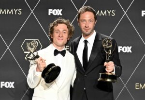 Jeremy Allen White, Emmy winner for lead actor in a comedy series for "The Bear" poses with Ebon Moss-Bachrach, Emmy winner for supporting actor in a comedy series for "The Bear", at the 75th Emmy Awards on Monday, Jan. 15, 2024 at the Peacock Theater in Los Angeles. (Photo by Dan Steinberg/Invision for the Television Academy/AP Images)