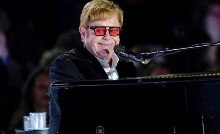 FILE - Elton John performs on the South Lawn of the White House in Washington on Sept. 23, 2022. John has achieved EGOT status. The famed British singer-pianist secured an Emmy Award on Monday night, Jan. 15, 2024, for best variety special (live) for “Elton John Live: Farewell from Dodger Stadium,” a three-hour concert documentary that streamed on Disney +. (AP Photo/Susan Walsh, File)