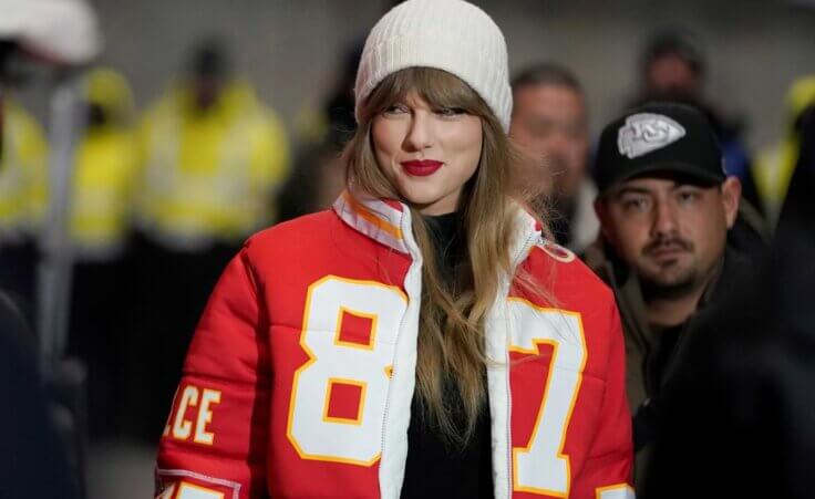 FILE - Taylor Swift wears a Kansas City Chiefs tight end Travis Kelce jacket as she arrives before an NFL wild-card playoff football game between the Chiefs and the Miami Dolphins, Saturday, Jan. 13, 2024, in Kansas City, Mo. A scourge of pornographic deepfake images generated by artificial intelligence and sexualizing people without their consent has hit its most famous victim, singer Taylor Swift, drawing attention to a problem that tech platforms and anti-abuse groups have struggled to solve. (AP Photo/Ed Zurga, File)