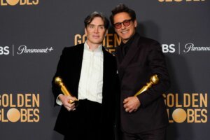 Cillian Murphy, left, winner of the award for best performance by an actor in a motion picture, drama for "Oppenheimer", and Robert Downey Jr., winner of the award for best performance by an actor in a supporting role in any motion picture for "Oppenheimer", pose in the press room at the 81st Golden Globe Awards on Sunday, Jan. 7, 2024, at the Beverly Hilton in Beverly Hills, Calif. (AP Photo/Chris Pizzello)