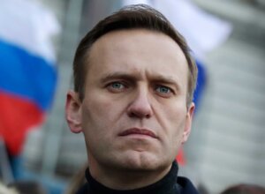 FILE - Russian opposition activist Alexei Navalny takes part in a march in memory of opposition leader Boris Nemtsov in Moscow, Russia on Feb. 29, 2020. Russia's prison agency says that imprisoned opposition leader Alexei Navalny has died. He was 47. The Federal Prison Service said in a statement that Navalny felt unwell after a walk on Friday Feb. 16, 2024 and lost consciousness. (AP Photo/Pavel Golovkin, File)