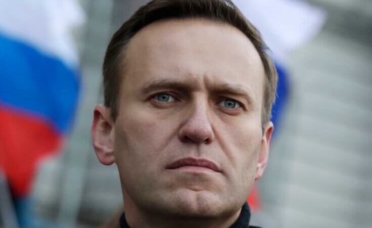 FILE - Russian opposition activist Alexei Navalny takes part in a march in memory of opposition leader Boris Nemtsov in Moscow, Russia on Feb. 29, 2020. Russia's prison agency says that imprisoned opposition leader Alexei Navalny has died. He was 47. The Federal Prison Service said in a statement that Navalny felt unwell after a walk on Friday Feb. 16, 2024 and lost consciousness. (AP Photo/Pavel Golovkin, File)