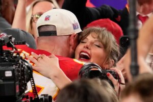 Taylor Swift embraces Kansas City Chiefs tight end Travis Kelce after the NFL Super Bowl 58 football game against the San Francisco 49ers, Sunday, Feb. 11, 2024, in Las Vegas. The Chiefs won 25-22 against the 49ers. (AP Photo/Abbie Parr)