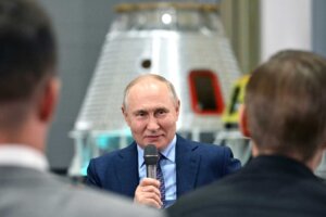 Russian President Vladimir Putin gestures while speaking to young scientists during his visit to the Rocket and Space Corporation (RSC) Energia in Korolev, outside Moscow, Russia, Thursday, Oct. 26, 2023. (Grigory Sysoev, Sputnik, Kremlin Pool Photo via AP)