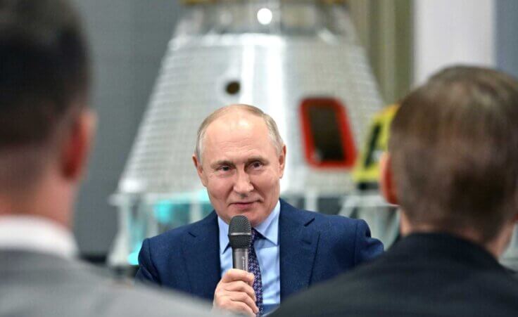 Russian President Vladimir Putin gestures while speaking to young scientists during his visit to the Rocket and Space Corporation (RSC) Energia in Korolev, outside Moscow, Russia, Thursday, Oct. 26, 2023. (Grigory Sysoev, Sputnik, Kremlin Pool Photo via AP)