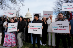 Devotees of TikTok gather at the Capitol in Washington, as the House passed a bill that would lead to a nationwide ban of the popular video app if its China-based owner doesn't sell, Wednesday, March 13, 2024. Lawmakers contend the app's owner, ByteDance, is beholden to the Chinese government, which could demand access to the data of TikTok's consumers in the U.S. (AP Photo/J. Scott Applewhite)