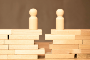 Two figurines on a divided stack of blocks. Bill Maher says abortion “kind of is” murder: The deepest fault line in American culture