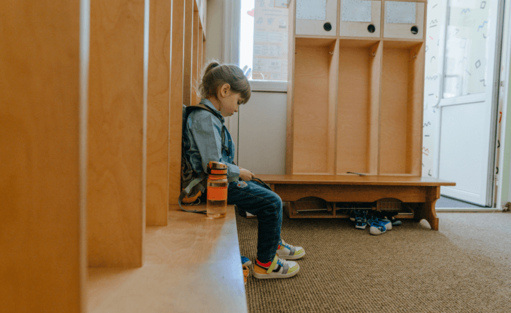 Little girl sitting in a locker room. Title IX expands discrimination to include sexual identity and orientation. Photo by lithiumphoto/stock.adobe.com