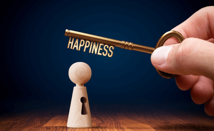 Key labeled "happiness" next to a figurine with a keyhole. By jirsak/stock.adobe.com How to buy happiness with time
